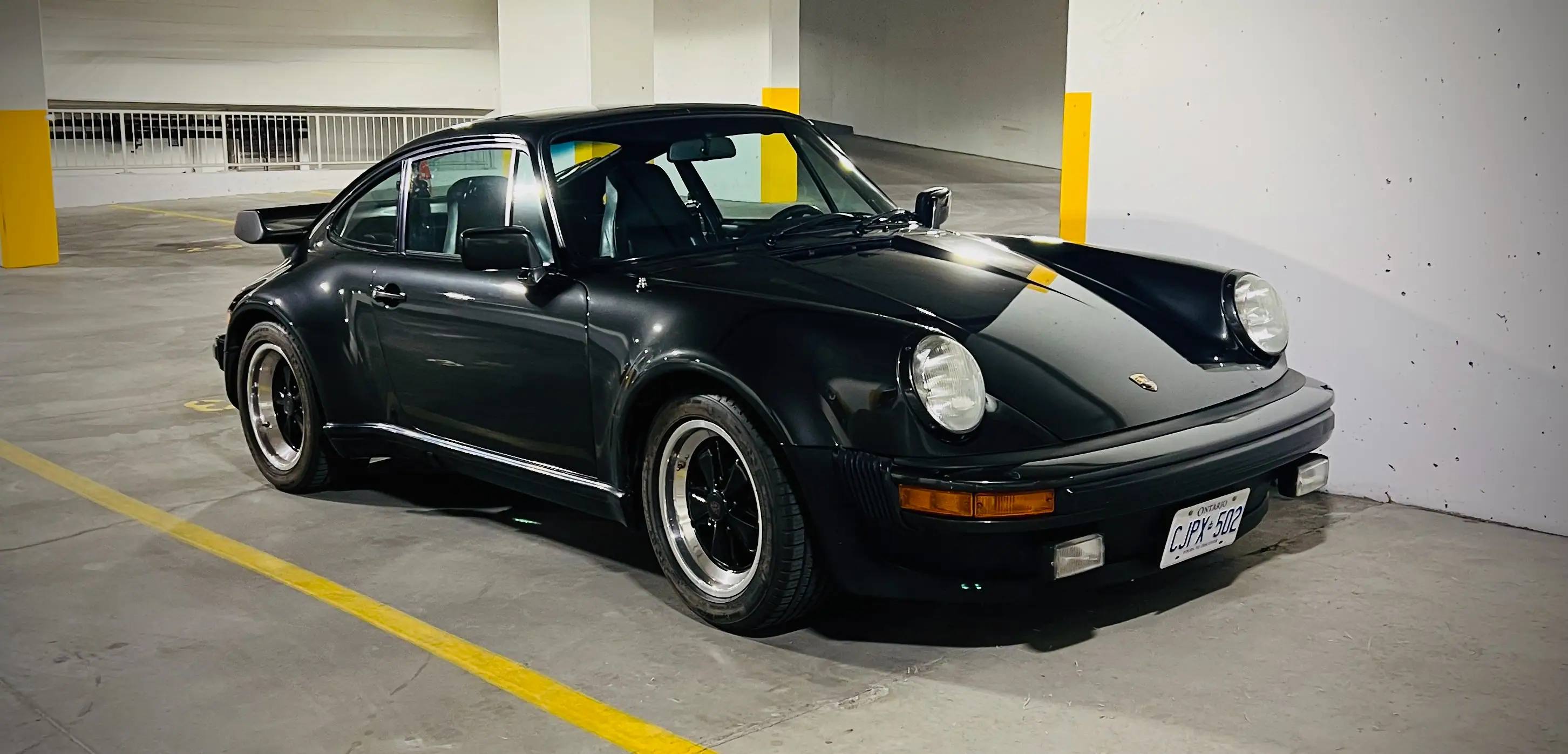 Black Porsche with Fuchs wheels